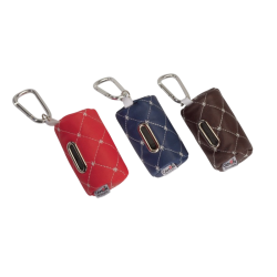 Dispensador de bolsas para perro de la marca Camon en color rojo, azul y marrón. Accesorio práctico y elegante para paseos.