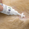 Aplicación de crema cicatrizante en piel